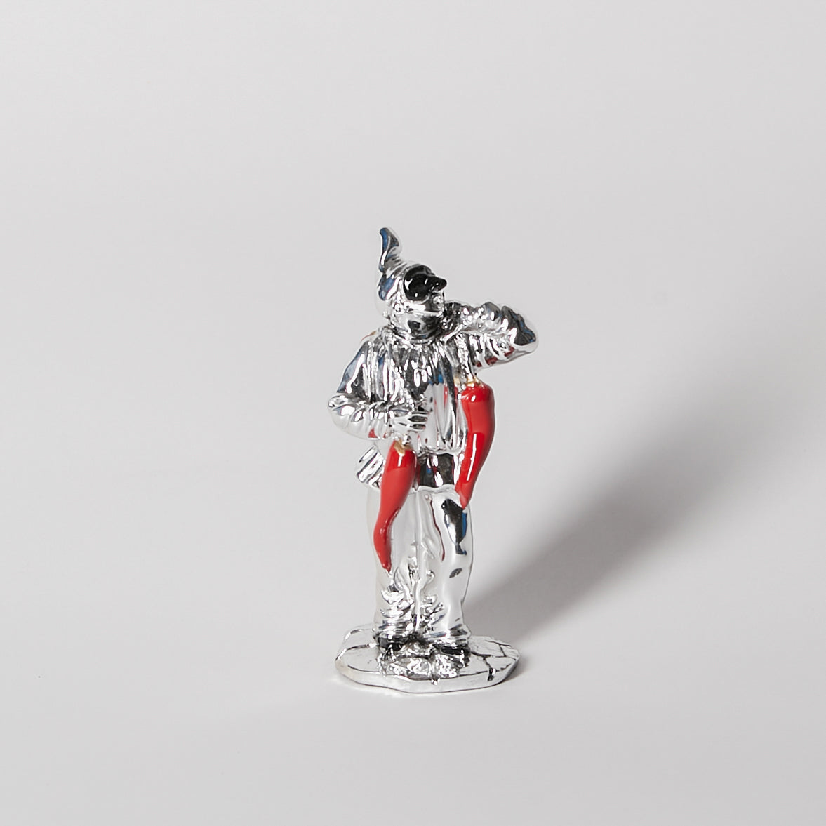 SILVER PULCINELLA STATUE WITH HORNS